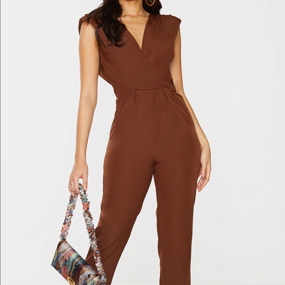 Chocolate Shoulder Pad Wrap Woven Jumpsuit | PrettyLittleThing